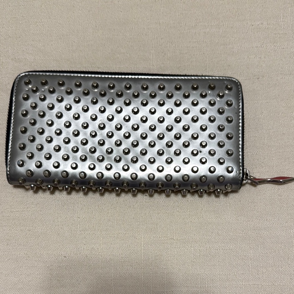 Authentic Christian Louboutin Spiked Zip-Around Wallet – Metallic Silver